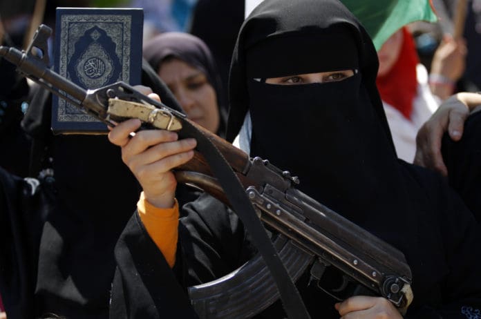 woman ISIS ak-47