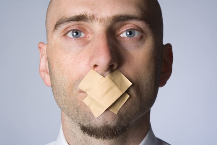 Muzzle gag man mouth silence tape