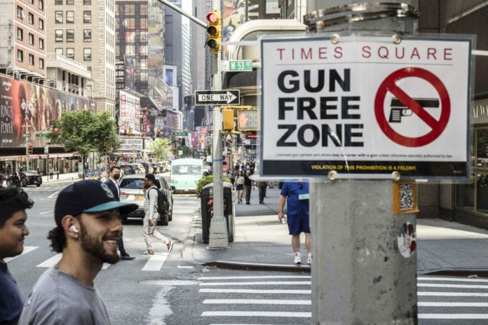 Times Square gun free zone sign gun-free