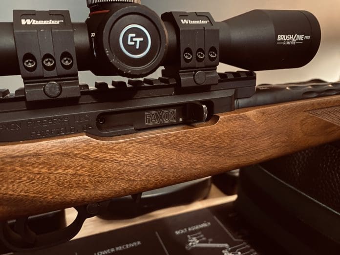 Faxon ruger 10/22 bolt in a rifle with a scope