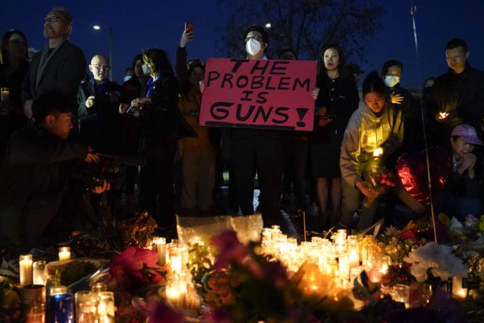 mass shooting vigil problem is guns