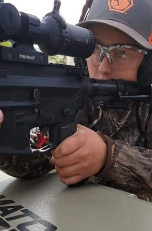 Ethan shooting an AR-15