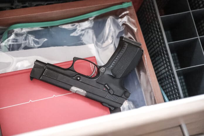 gun pistol handgun nightstand night stand drawer