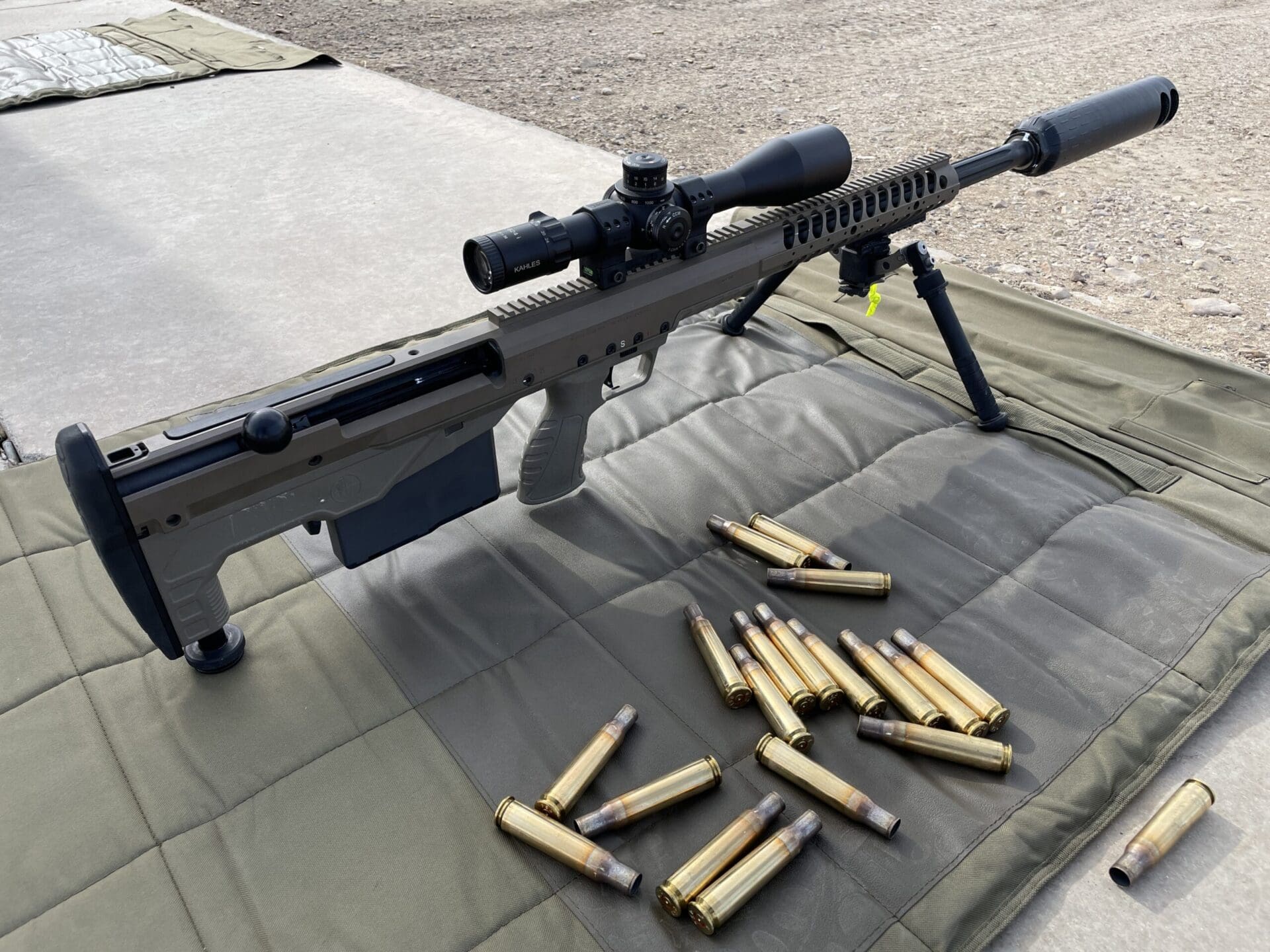 Desert Tech HTI .50 BMG rifle with Huxwrx suppressor 