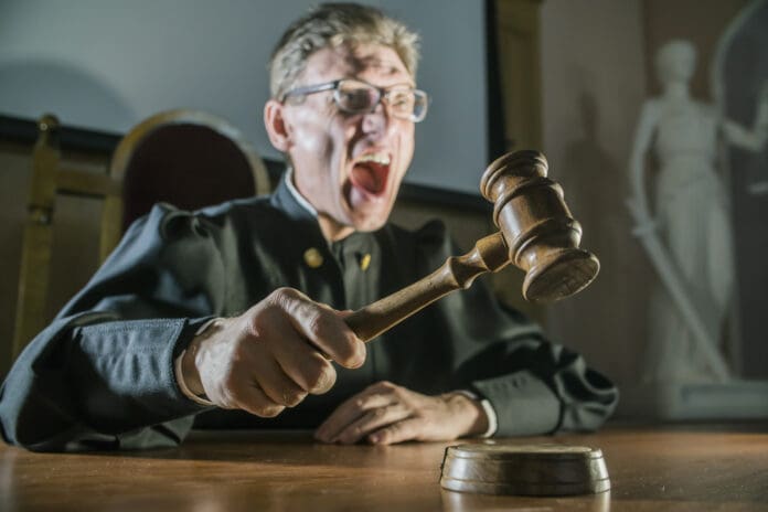 old judge gavel angry