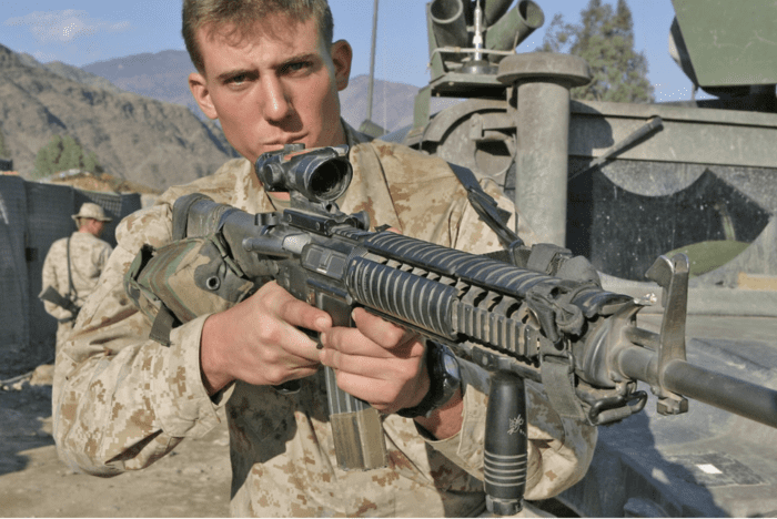 Sgt. Jason Burchs displays his M16 A4 rifle